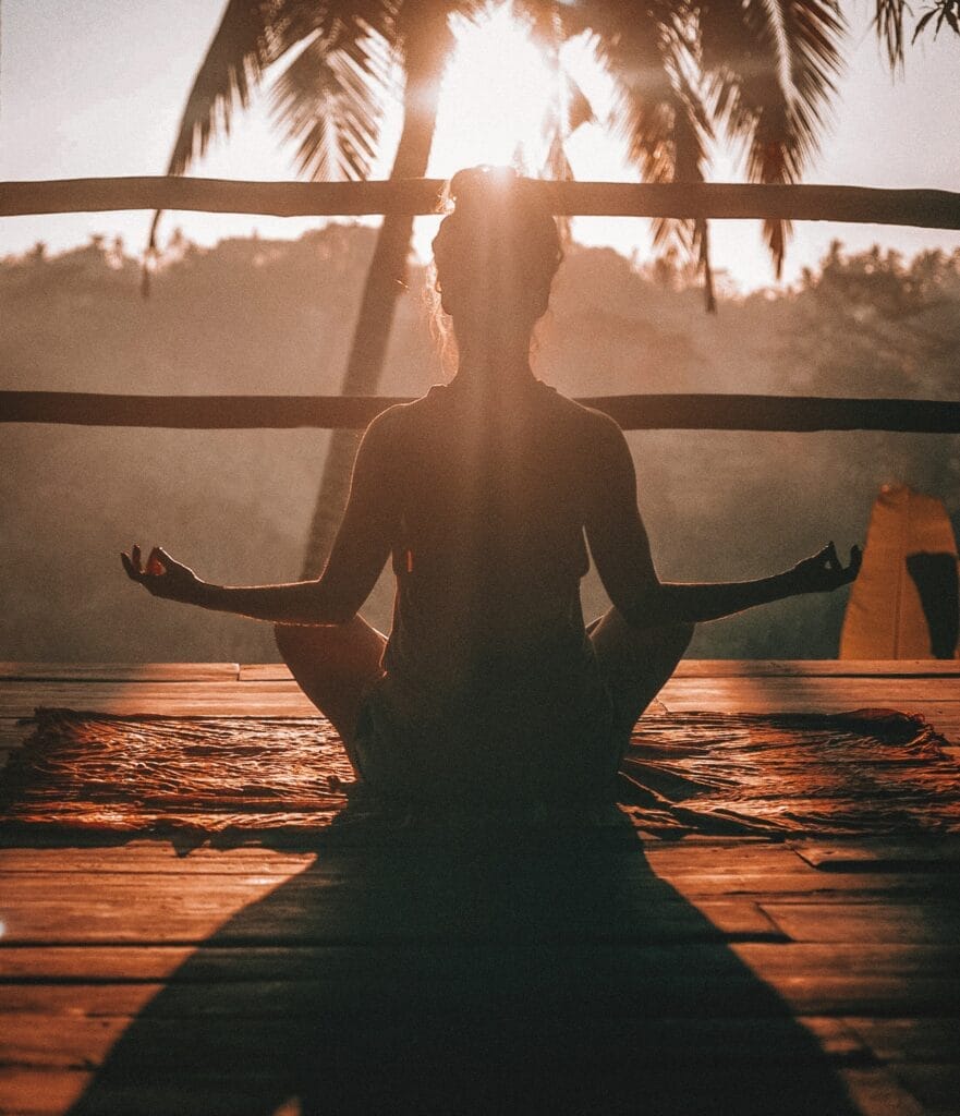 A morning yoga session peering into the jungle in Ubud, Bali demonstrating how investing does not have to be complicated, it just takes consistency and dedication.